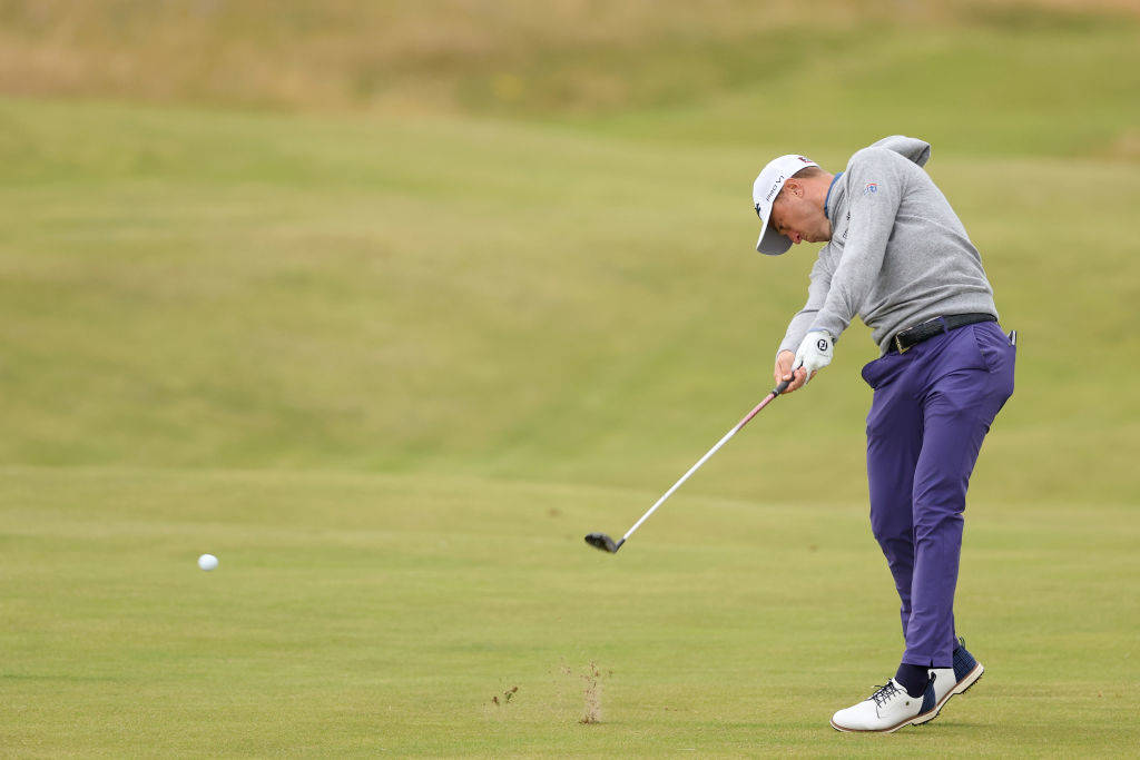 Justin Thomas hits a shot